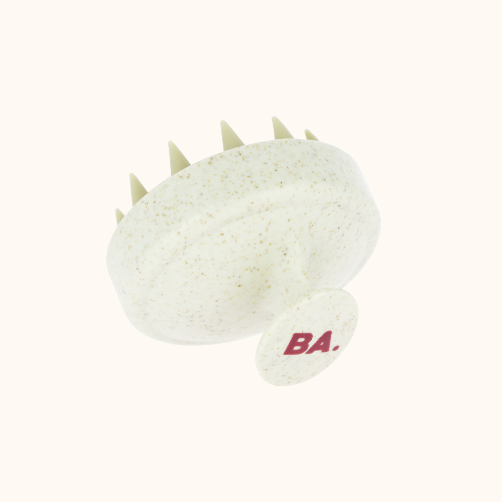 La brosse shampoing massante avec le logo BA